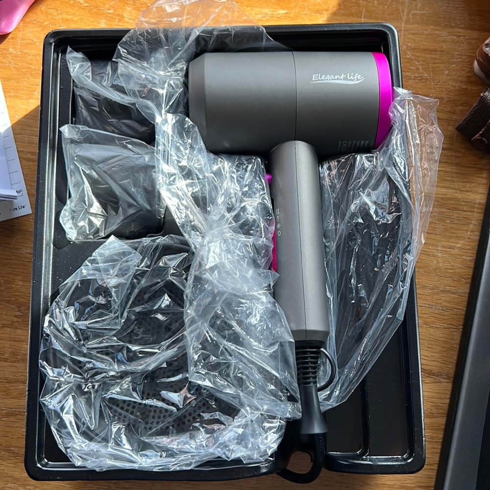 BNIB Hair Dryer with attachments